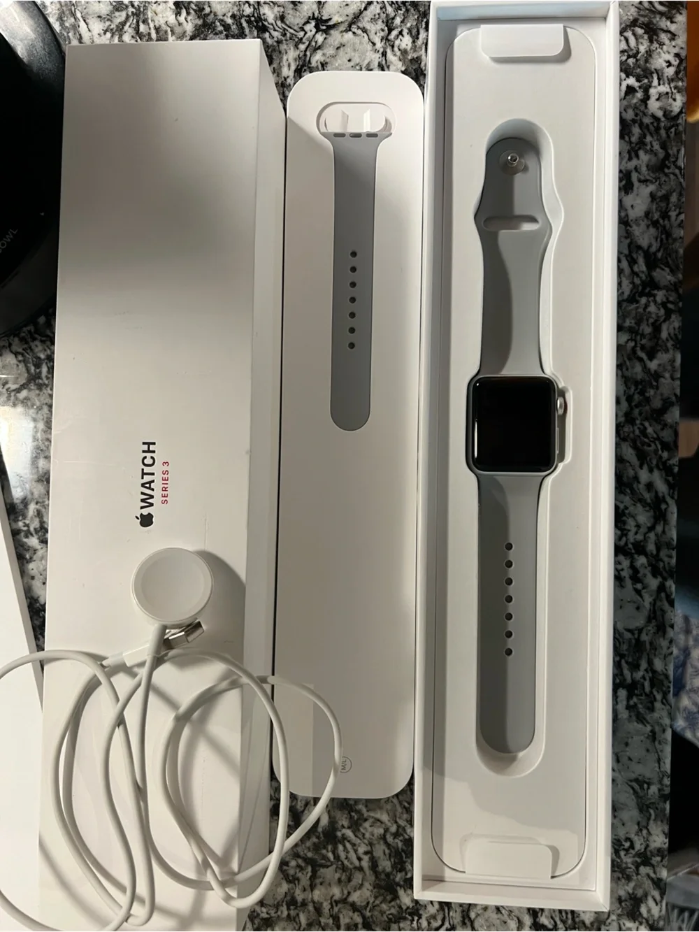 Apple Watch Series 3 Cellular with charger